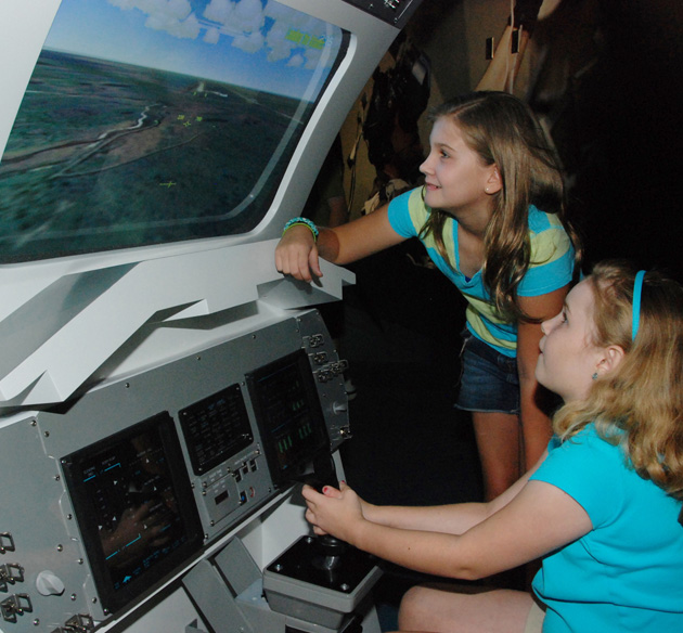 Children Operating Landing Simulator