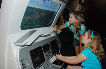 Children Operating Landing Simulator