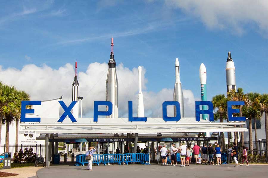 Front gates at Kennedy Space Center Visitor Complex with the Rocket Garden in the background