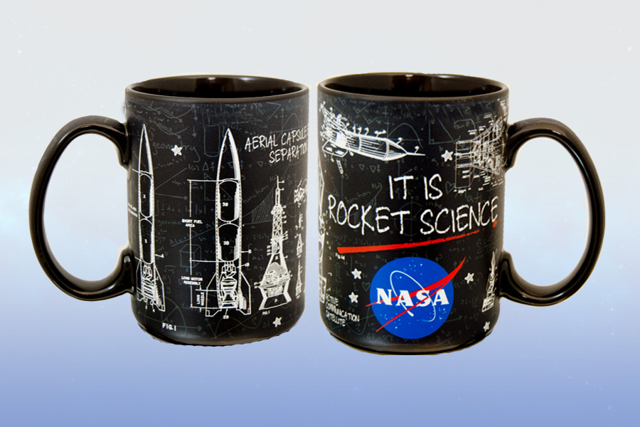 Ceramic mug with various scientific graphs and mockups on it along with the quote 'It's Rocket Science'.
