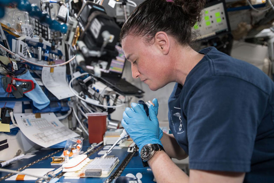 Expedition 57 Flight Engineer Serena Auñón-Chancellor is pictured mixing protein crystal samples to help scientists understand how they work.