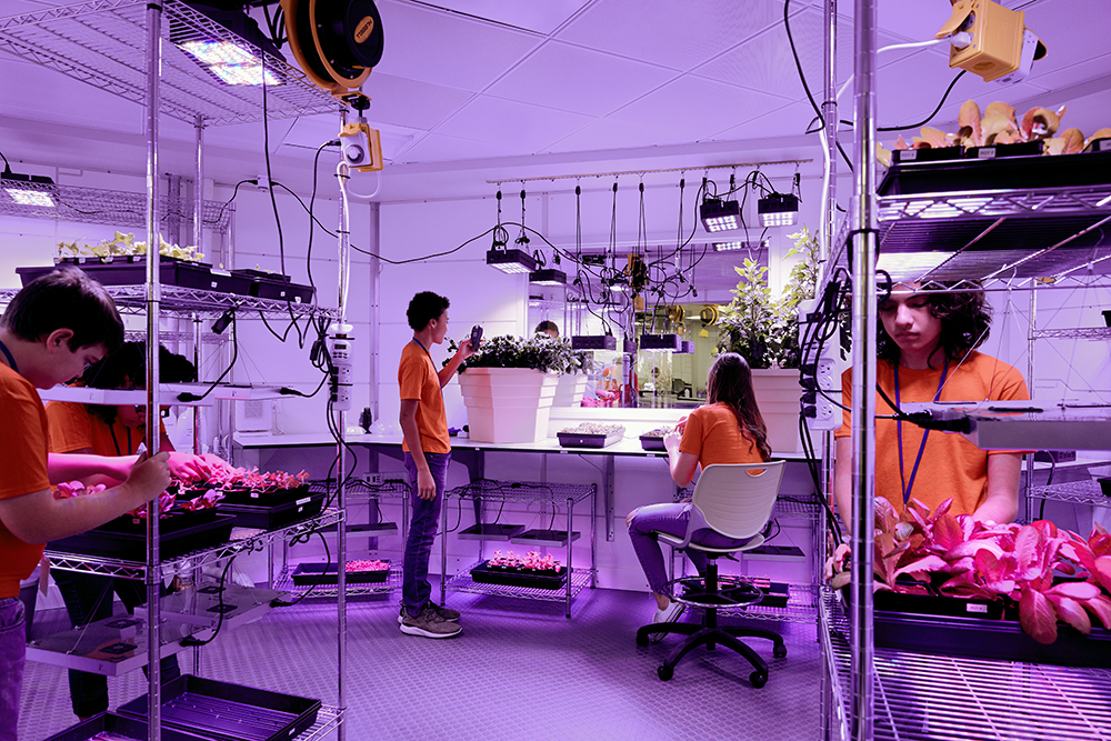 Students working in the Mar Base 1 Botany Lab in the ATX Center at Kennedy Space Center Visitor Complex.