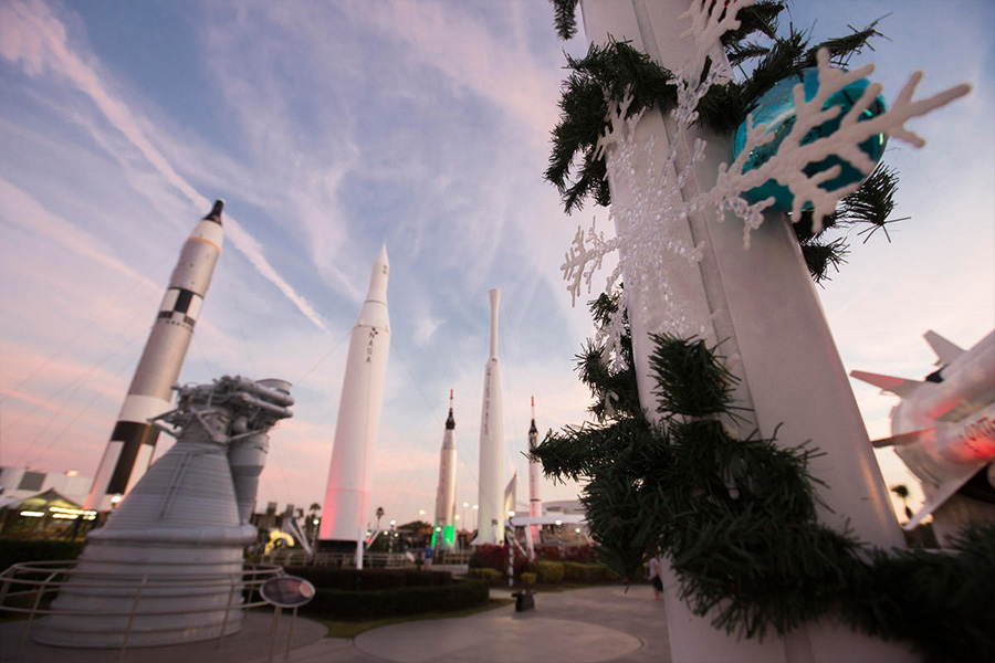 Holiday decor such as snowflakes grace the Rocket Garden at Kennedy Space Center Visitor Complex for Holidays in Space.
