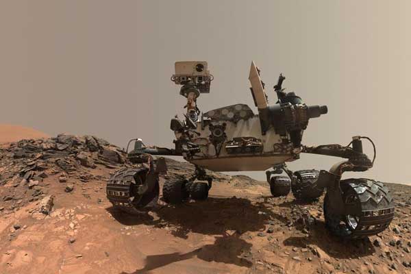 This low-angle self-portrait of NASA's Curiosity Mars rover shows the vehicle at the site from which it reached down to drill into a rock target called 'Buckskin' on lower Mount Sharp. 
