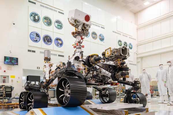 In a clean room at NASA's Jet Propulsion Laboratory in Pasadena, California, engineers observed the first driving test for NASA's Mars 2020 rover on Dec. 17, 2019. 