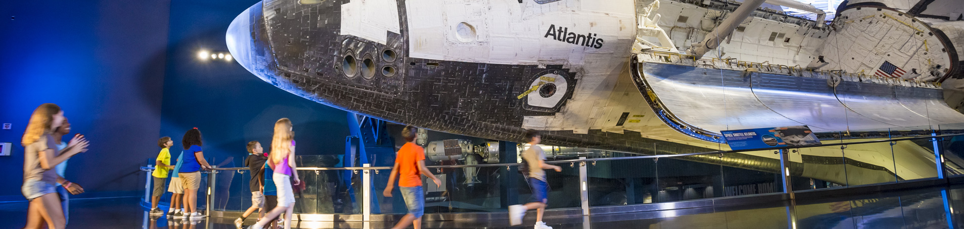 Children at Space Shuttle Atlantis exhibit