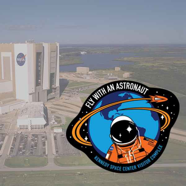 Fly With An Astronaut Logo with VAB in the background